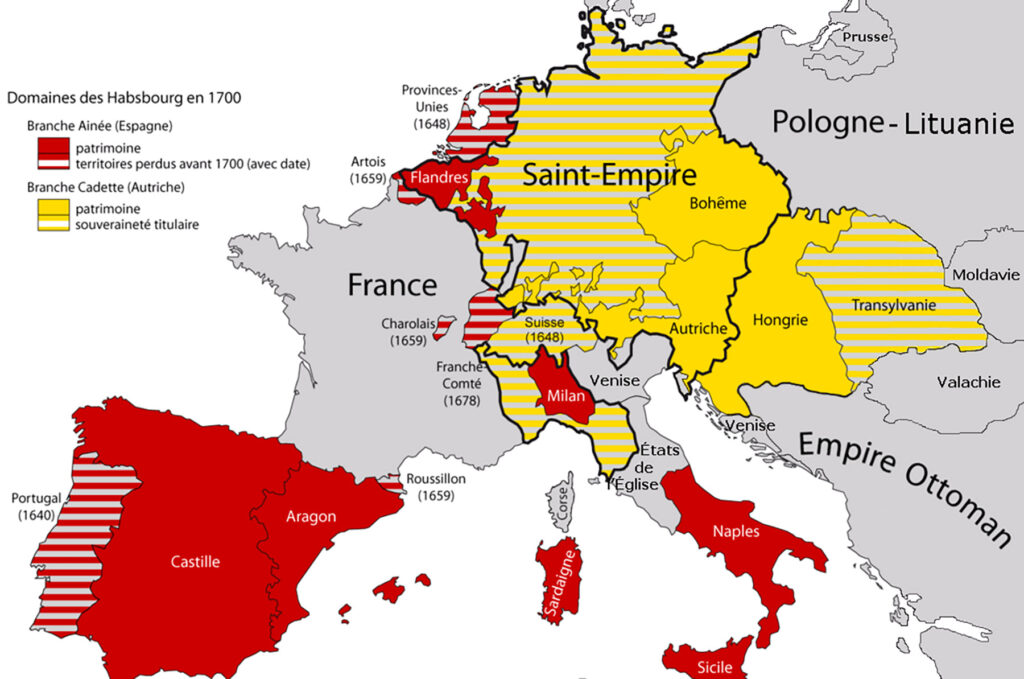 Carte : Le domaine des Habsbourg en 1700. En rouge, le patrimoine espagnol de la branche aînée (Habsbourg d’Espagne) disputé par la branche cadette (Habsbourg d’Autriche) et Louis XIV lors la guerre de Succession d’Espagne.